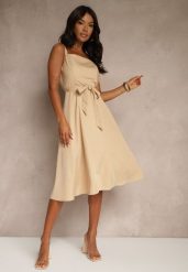 Beżowa Rozkloszowana Sukienka z Wiskozą w Paski Dolavessa. Brązowe sukienki damskie Renee, bez wzorów, z wiskozy, eleganckie, bez ramiączek. W wyprzedaży za 83.99 zł.