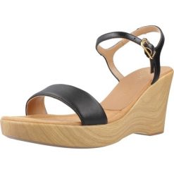 Sandały UNISA RITA NTO Czarny. Czarne sandały damskie Unisa, bez wzorów, ze skóry, bez obcasa, bez zapięcia. Za 354.99 zł.