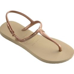 Klapki Havaianas Model 4144756 Kolor Brąz. Brązowe klapki damskie Havaianas, bez wzorów, z gumy, bez obcasa, bez zapięcia. Za 69.99 zł.