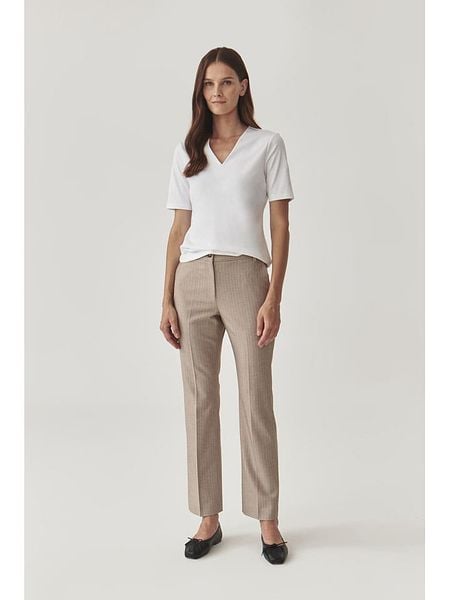 TATUUM Koszulka w kolorze białym rozmiar: XS. Białe koszulki damskie TATUUM, xs, bez wzorów, z bawełny, bez kołnierzyka, bez ramiączek. Za 115.95 zł.