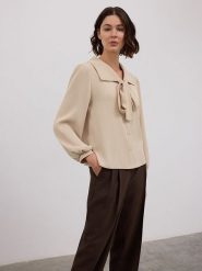 BGN Bluzka w kolorze beżowym rozmiar: 34. Brązowe bluzki damskie BGN, bez wzorów, bez kołnierzyka, bez ramiączek. Za 78.99 zł.