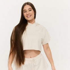 Bluza damska fitness z kapturem krótka Relay Cropped Pearl. Białe bluzy damskie GYMBEAM, l, bez wzorów, z bawełny, z kapturem. Za 128.90 zł.