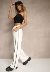 Jasnobeżowe Szerokie Spodnie Dresowe High Waist Zdobione Lampasami Sopaline. Brązowe spodnie dresowe damskie Renee, l, z aplikacjami, z dresówki. Za 49.99 zł.