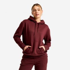 Bluza z kapturem damska Essential. Fioletowe bluzy damskie Decathlon, l, bez wzorów, z materiału, z kapturem. Za 89.99 zł.
