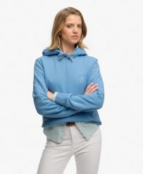 Superdry Bluza z kapturem Essential Logo haftowana – krój relaxed. Niebieskie bluzy damskie Superdry, z aplikacjami, z bawełny, z kapturem. Za 282.85 zł.