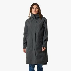 Płaszcz wiatroszczelny kobieca Swedemount Öckerö Shell Coat. Niebieskie płaszcze damskie SWEDEMOUNT, xl, bez wzorów, z materiału, z kapturem. Za 699.99 zł.