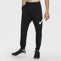Spodnie treningowe damskie Nike Taper. Czarne obuwie sportowe damskie Nike, bez zapięcia, na fitness i siłownię. Za 492.00 zł.