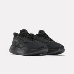 Reebok DMX Comfort czarne sneakersy treningowe unisex (100034134). Czarne obuwie sportowe damskie Reebok, z materiału, bez zapięcia, na fitness i siłownię. Za 289.00 zł.