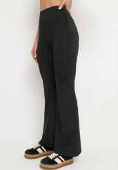 Czarne Spodnie Legginsy Typu Dzwony z Wysokim Stanem Melonell. Czarne legginsy damskie Born2be, m, bez wzorów, z jeansu. Za 49.99 zł.