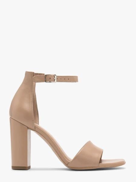 Beżowe sandały na wysokim słupku. Brązowe sandały damskie Ryłko, bez wzorów, z gumy, bez obcasa, na obcasie, bez zapięcia. W wyprzedaży za 199.99 zł.