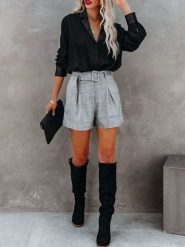 Milan Kiss Bluzka w kolorze czarnym rozmiar: M. Czarne bluzki damskie Milan Kiss, m, bez wzorów, bez kołnierzyka, bez ramiączek. Za 130.99 zł.