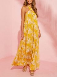 Milan Kiss Sukienka w kolorze żółto-białym rozmiar: XL. Żółte sukienki damskie Milan Kiss, bez wzorów, z wiskozy, bez ramiączek. Za 208.83 zł.