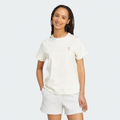 Koszulka z grafiką kota. Białe bluzki damskie Adidas, xl, bez wzorów, z bawełny, bez kołnierzyka, bez ramiączek. Za 149.00 zł.