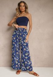 Niebieskie Bawełniane Spodnie Boho w Stylu Palazzo z Gumką w Pasie i Wysokim Stanem Pravia. Niebieskie spodnie materiałowe damskie Renee, bez wzorów, z bawełny. Za 44.99 zł.