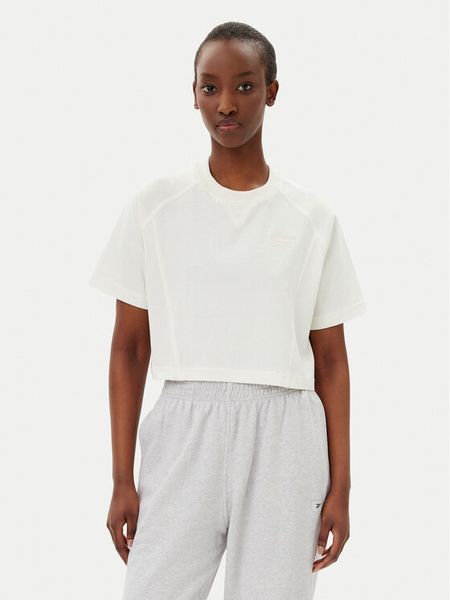 Reebok T-Shirt 100214091 036-90-02 Écru Regular Fit. T-shirty damskie Reebok, m, bez wzorów, z bawełny, bez kołnierzyka. Za 69.99 zł.