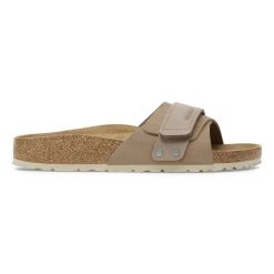 Klapki damskie BIRKENSTOCK Oita W LENB/LEVE Taupe. Brązowe klapki damskie Birkenstock, bez wzorów, z zamszu, bez obcasa, bez zapięcia. Za 449.99 zł.
