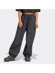 Adidas Spodnie dresowe w kolorze czarnym rozmiar: M. Czarne spodnie dresowe damskie Adidas, m, bez wzorów, z dresówki. Za 162.49 zł.