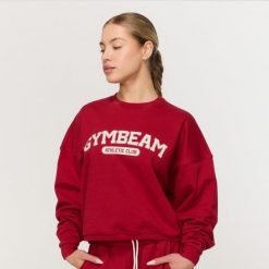 Bluza damska fitness bez kaptura czerwona Varsity. Czerwone bluzy damskie GYMBEAM, l, bez wzorów, z bawełny, bez kaptura. Za 139.90 zł.