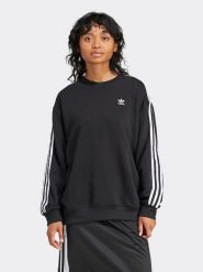 Adidas Bluza w kolorze czarnym rozmiar: M. Czarne bluzy damskie Adidas, m, bez wzorów, z bawełny, bez kaptura. Za 180.06 zł.