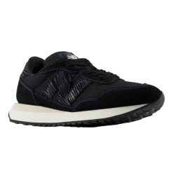 Trampki Damskie Skóra 237. Czarne trampki damskie New Balance, bez wzorów, z gumy, bez zapięcia. Za 587.99 zł.