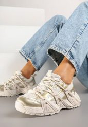 Złote Sneakersy z Ozdobnym Sznurowaniem i Tłoczoną Podeszwą Nurilune. Żółte obuwie sportowe damskie Born2be, z jeansu, bez zapięcia. Za 99.99 zł.
