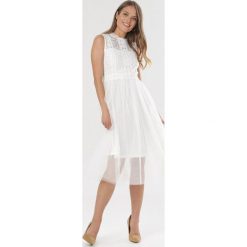 Biała Sukienka Ortiz. Białe sukienki damskie Born2be, w ażurowe wzory, z koronki, wizytowe, bez ramiączek. Za 169.99 zł.