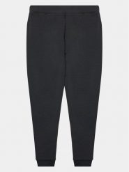 Under Armour Spodnie dresowe Motion Jogger 1377112 Czarny Regular Fit. Czarne spodnie dresowe dziewczęce Under Armour, bez wzorów, z dresówki. Za 99.99 zł.