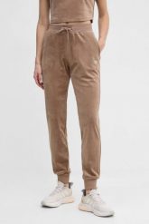 GUESS Brązowe damskie spodnie welurowe Couture. Brązowe spodnie dresowe damskie Guess, s, z aplikacjami, z dresówki. W wyprzedaży za 236.99 zł.