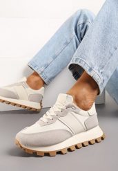 Beżowe Sneakersy z Ekoskóry z Przeszyciami na Podeszwie z Protektorem Pomadia. Brązowe obuwie sportowe damskie Born2be, bez zapięcia. Za 99.99 zł.