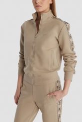 GUESS Beżowa damska bluza rozpinana z lampasami Britney, Rozmiar XS. Brązowe bluzy damskie Guess, xs, z aplikacjami, bez kaptura. Za 489.99 zł.