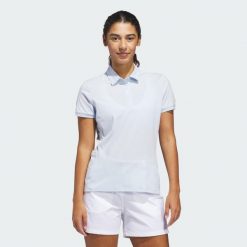 Koszulka Ultimate365 Tour Twistknit Polo. Niebieskie koszulki damskie Adidas, bez wzorów, z materiału, bez kołnierzyka, bez ramiączek. Za 329.00 zł.