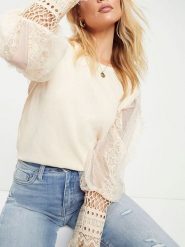 Milan Kiss Bluzka w kolorze kremowym rozmiar: M. Brązowe bluzki damskie Milan Kiss, m, bez wzorów, z koronki, bez kołnierzyka, bez ramiączek. Za 130.99 zł.