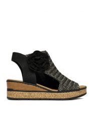 Rieker Sandały CEO-63791-01 Czarny. Czarne sandały damskie Rieker, bez wzorów, z materiału, bez obcasa, na koturnie, bez zapięcia. Za 359.99 zł.