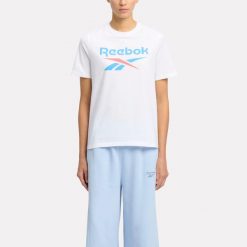 Koszulka damska Reebok Gym & Pilates. Bluzki damskie Reebok, l, bez wzorów, z bawełny, bez kołnierzyka, bez ramiączek. W wyprzedaży za 89.99 zł.