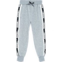 Jasnoszare Spodnie Dresowe Heated. Spodnie dresowe chłopięce marki 4F. Za 59.99 zł.
