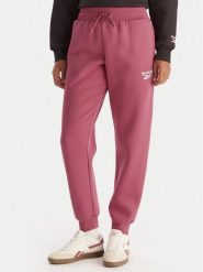 Reebok Spodnie dresowe Erika RK25164CCW Różowy Regular Fit. Czerwone spodnie dresowe damskie Reebok, xl, bez wzorów, z dresówki. Za 199.99 zł.