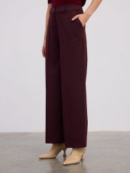 BGN Spodnie w kolorze bordowym rozmiar: 40. Czerwone spodnie materiałowe damskie BGN, bez wzorów, z materiału. Za 171.28 zł.