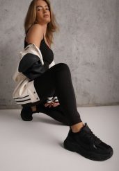 Czarne Legginsy Basic z Modelującą Wstawką w Pasie Liacan. Czarne legginsy damskie Renee, l, bez wzorów, z jeansu. Za 49.99 zł.