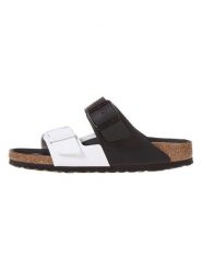 Birkenstock Klapki "Arizona Split" w kolorze biało-czarnym rozmiar: 39. Białe klapki damskie Birkenstock, bez wzorów, z otwartym noskiem, bez obcasa, bez zapięcia. Za 344.54 zł.