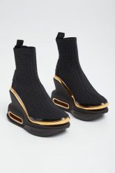 Botki damskie na koturnie BALMAIN. Botki damskie Balmain, bez obcasa, na koturnie, bez zapięcia. W wyprzedaży za 4,716.75 zł.