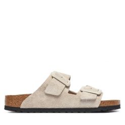 Klapki Birkenstock. Białe klapki damskie Birkenstock, bez wzorów, bez obcasa, bez zapięcia. Za 629.99 zł.