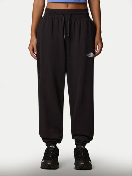 The North Face Spodnie dresowe Essential NF0A8C1G Czarny Relaxed Fit. Czarne spodnie dresowe damskie The North Face, s, bez wzorów, z bawełny. Za 229.99 zł.