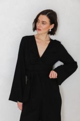 BLUZKA TAYLOR CZARNA M - Flawless. Czarne bluzki damskie Flawless, m, bez wzorów, eleganckie, bez kołnierzyka, bez ramiączek. Za 354.45 zł.