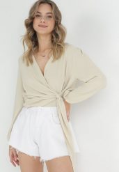 Jasnobeżowa Kopertowa Bluzka z Wiązaniem Maerise. Brązowe bluzki damskie Born2be, bez wzorów, z jeansu, klasyczne, bez kołnierzyka, bez ramiączek. Za 59.99 zł.
