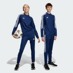 Tiro 23 Club Training Pants. Białe spodnie dresowe damskie Adidas, bez wzorów, z dresówki. Za 110.99 zł.