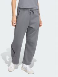 Adidas Spodnie materiałowe Z.N.E. OPEN HEMZ.N.E. OPEN HEM Szary Loose Fit. Szare spodnie materiałowe damskie Adidas, bez wzorów, z materiału. Za 398.99 zł.