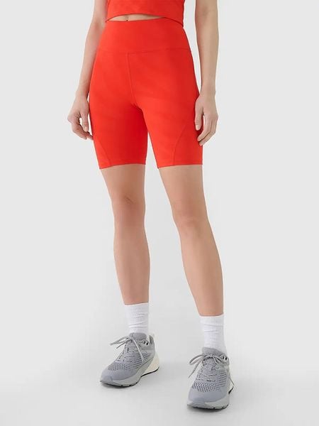 4F Szorty funkcyjne w kolorze pomarańczowym rozmiar: XL. Pomarańczowe spodenki sportowe damskie 4F, xl, bez wzorów, z materiału, na fitness i siłownię. Za 34.93 zł.