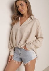 Niebieskie Szorty Jeansowe z Bawełną i Wysokim Stanem Ozdobione Postrzępieniem Stineans. Niebieskie szorty damskie Born2be, bez wzorów, z bawełny, z podwyższonym stanem. Za 89.99 zł.