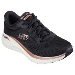 Tenisówki Skechers Model Arch Fit 2.0-glow Th Kolor Czarny. Czarne obuwie sportowe damskie Skechers, z syntetyku, bez zapięcia, tenisowe. Za 399.99 zł.