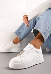 Białe Sneakersy z Cyrkoniami na Sznurówkach z Platformą Nomiji. Białe obuwie sportowe damskie Renee, z jeansu, bez zapięcia. Za 79.99 zł.